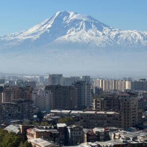 Scenic panorama of Yerevan city with Mount Ararat in the background, showcasing urban landscape under a clear sky.