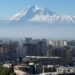 Scenic panorama of Yerevan city with Mount Ararat in the background, showcasing urban landscape under a clear sky.