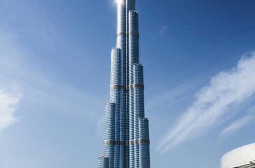Stunning daytime view of Burj Khalifa against a clear blue sky in Dubai.